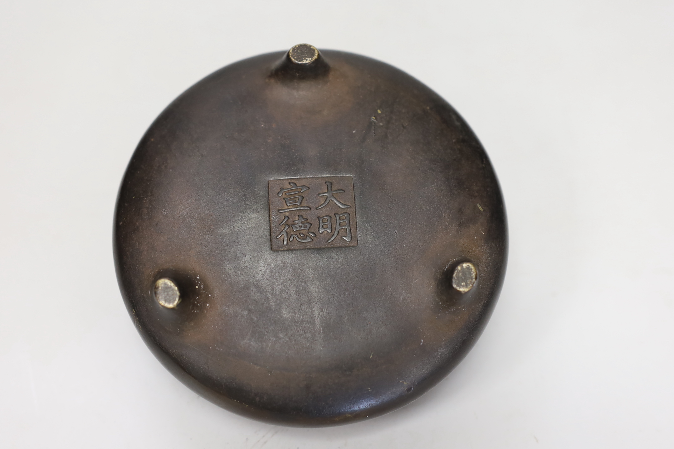 A Chinese bronze censer, ding, 8cm tall